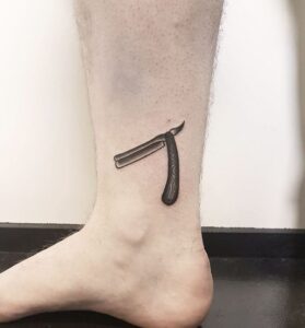 30+ Terrifyingly Small Horror Movie Tattoos for True Scary Film Fans
