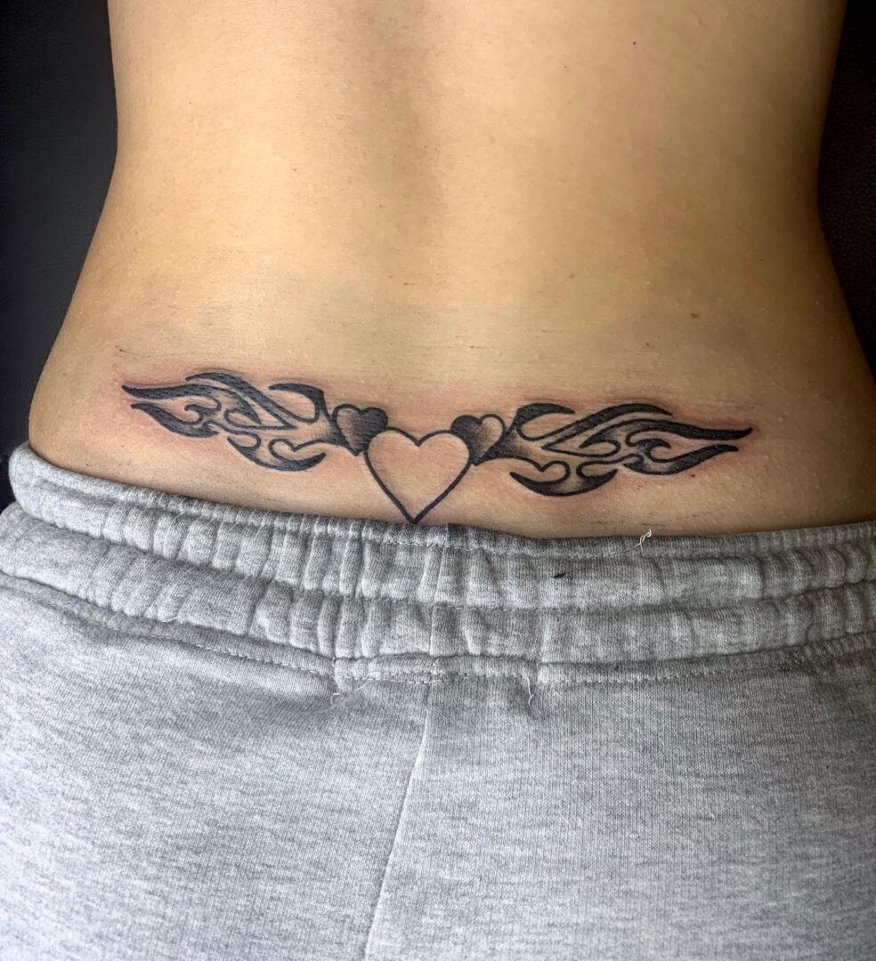 30 Chic Lower Back Tattoos That Are Bold Stylish And Unique 30-chic-lower-back-tattoos-that-are-bold-stylish-and-unique